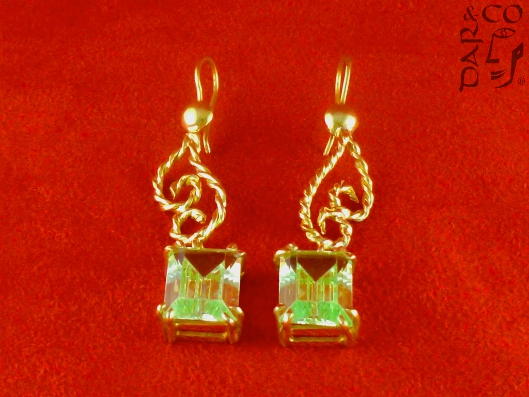 Aretes y collar en plata 925 y piedras semipreciosas.
