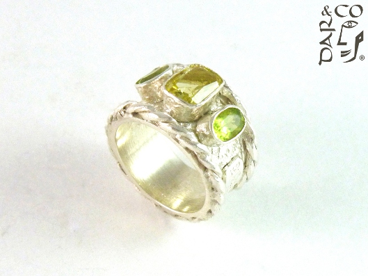 ANILLO PLATA 925 Y PERIDOTS.