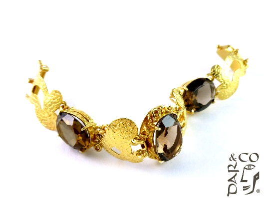 Pulsera plata 925 baño oro y cuarzos ahumados.