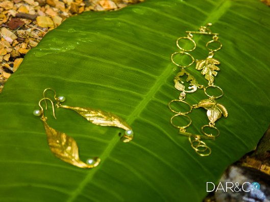 Juego plata 925 / baño oro 22 kt (pulsera y aretes).